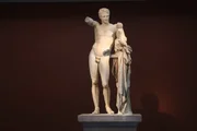 Hermes holding the infant Dionysus. Created by the master sculptor Praxiteles. The statue was found in the Temple of Hera. Olympia Museum.