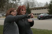 Field producer Tania Castellanos and Interviewee Jo Lynn Mulcahy are on the field.