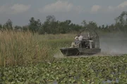 Kip and Ward on an airboat.