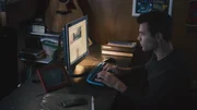 Brandon on the computer.