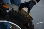 El Paso, TX: Officers taking out blocks of hidden marijuana from inside a wheel. Smugglers use may techniques and methods to hide and deliver contraband across the border.