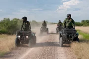 Laredo, TX: Customs and Border Protection agents patrolling the border on ATVs.  (Photo Credit: © NGT)