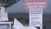 A sign at West Virginia's National Radio Astronomy Observatory in Green Bank warns visitors to turn off electric devices to prevent them from interfering with radio telescope operation.