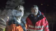 Odda, Norway - (Left to right) Tor Steinat Tveit (one of Thord´s employees) and Bjørn Lægreid (the main cast in Eidfjord) are working together in this rescue to help a post-truck in the water.