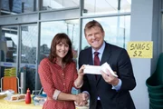 Abi (Natalie Saleeba) and Barry James (Darren Mort). Abi gets the winning shot at P&C sausage sizzle.