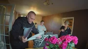 Police officer investigating a house