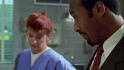 Detective Ed Green (Jesse L. Martin)