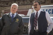 Pictured: Mike Pniewski as Vaughn Morgan, Tom Selleck as Frank Reagan.