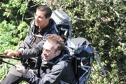 Bear Grylls (l.), Tom Arnold