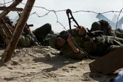 Kampfhandlungen nach der Landung der Alliierten in Omaha Beach (Reenactment)