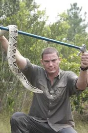 Donald Schultz in Belize with a Central American Rattlesnake.