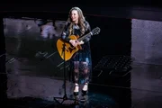 Maisy Stella as Daphne Conrad.