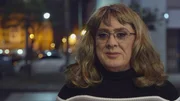 Lucy stands outside Hamburger Mary's. Her first night out presenting as a woman.
