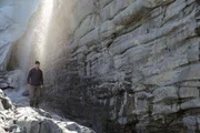 Jeremy Wade walking through Worthington Glacier.