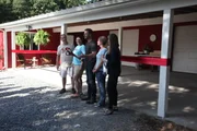 Host Dave and BARK owners Bob and Claire about to cut the ribbon on new BARK facility.