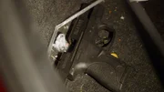While processing the car, Detectives are surprised to find a gun.