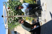 Grant Reynolds and Kevin Moore attempt to make breakfast using the power the sun.