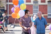 Kane (Gyton Grantley) and Lewis (Gary Sweet) at the Book Parade.
