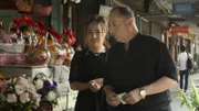 David looks at some flowers with Annie.