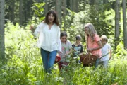 Angelika Prentner and the children - collecting herbs