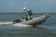 Laredo, TX: Customs and Border Protection agents patrolling the waterways in Laredo.