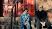 L-R: Young Matt (Skylar Gaertner), Father Lantom (Peter McRobbie)