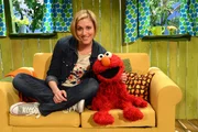 Elmo (re.) und Julia (li.) erraten Obstsorten.