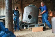Mark and Digger moving a still.