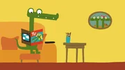 Das Krokodil studiert das Programm.
