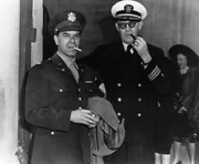 An Oscar statuette earned by Frank Capra's 1942 documentary "Prelude to War," the first film in the United States Army Special Services' seven-picture "Why We Fight" series, has been removed from the auction block and was returned to the care of the U.S. Army this evening (9/3/08).
Pictured: Frank Capra and John Ford during World War II,undated.