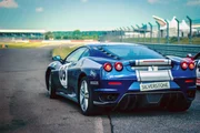 A car, a car on a track, fast car