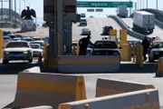 El Paso, TX: Officers searching cars at the Port of Entry.