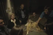 Recreation of family gathered in kitchen
