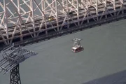 Closeup of Roosevelt Island Tramway and Queensboro Bridge, looking south
