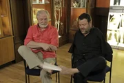 Picture Shows: Foot painter, Tom Yendell, passes presenter, Dr George McGavin a sketch. From left: Presenter, Dr George McGavin; Tom Yendell, who was born without arms due to the drug Thalidomide.