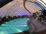 Indoor swimming pool lit at night. Khan Shatyr, the world's biggest tent, located in Astana, Akmola Province, Kazakhstan.
(Photo Credit: © The Gamma Project Ltd.)