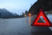 Odda, Norway - Road and accident sign.