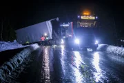 Overhalla, Norway - Total of the accident. Slippery and icy road. Truck in the ditch.