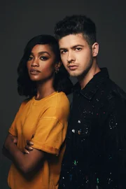 Rachel Lindsay, Travis Mills