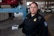 Brownsville POE, USA: CBP Officer Gonzalez holds up one of the packages found. All in all they found three packages of cocaine with a total of 6.52 Kg of cocaine.