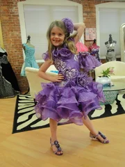 Charlotte Connerton trying on her 7th birthday dress.