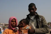 Laxmi with her mother Sarvesh and father Om Prakash.