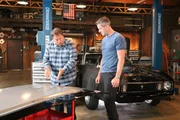 Mike Brewer and Ant Anstead with Mustang and hood.