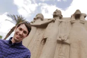 Picture Shows: Alastair with large statues‚ì Cairo Museum Garden