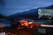 Odda, Norway - Towing truck drags a smashed car.
 (photo credit:  National Geographic)