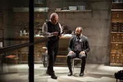 On left: Dr. Robert Ford (Anthony Hopkins) and on right Bernard Lowe (Jeffrey Wright).