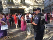 Police officer, pedestrians - paris