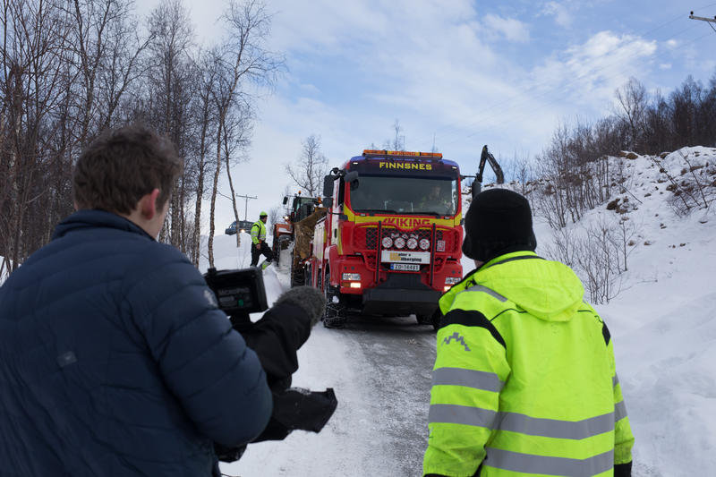 FINNSNES, NORWAY -  Frank Sebulonsen and the crew tow the dumper down a steep hill.  (photo credit:  National Geographic Channels/ITV Studios Norway)