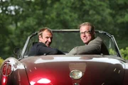 Norbert Heisterkamp und Torsten Knippertz helfen Menschen bei der Autosuche.