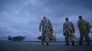 3 Pilots walking towards the planes ready to fly in Bermuda.